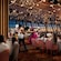 An artist rendering of several Disney Characters greeting Guests in the Hollywood Spotlight Club dinner club on the Disney Adventure